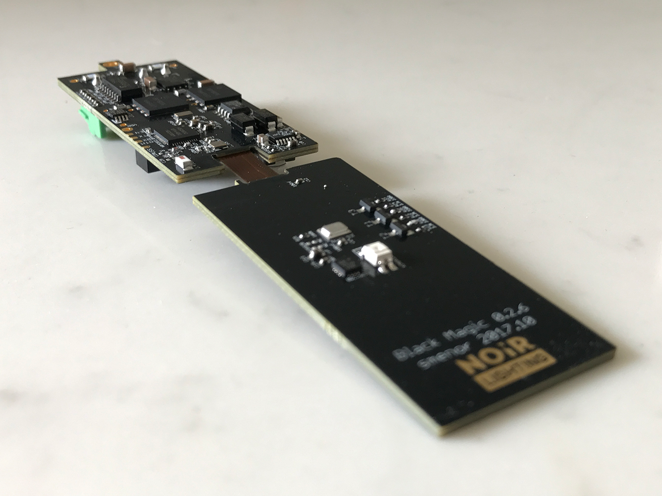 Rigid Flex Noir board including analog sensors, low voltage digital, offline power, and 120/240VAC sense and switching power electronics