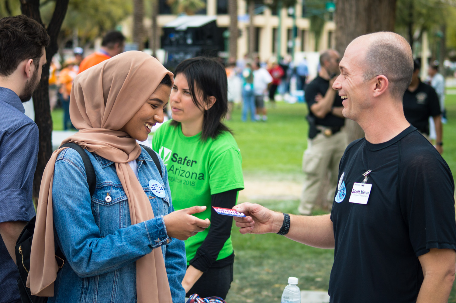 Scott campaigning in 2018 handing a business card to someone at the Arizona State Capital