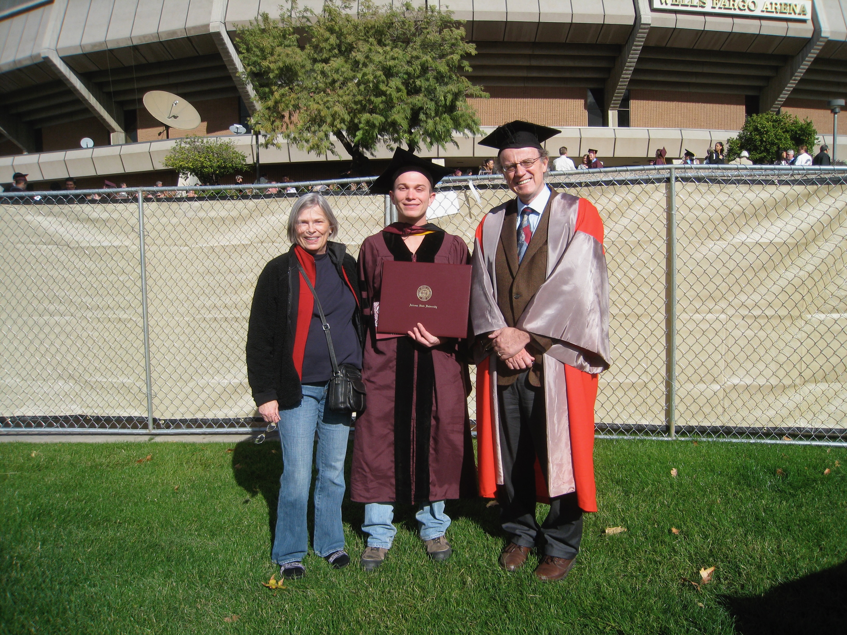 PhD graduation picture showing my mom and advisor, Michael Thorpe